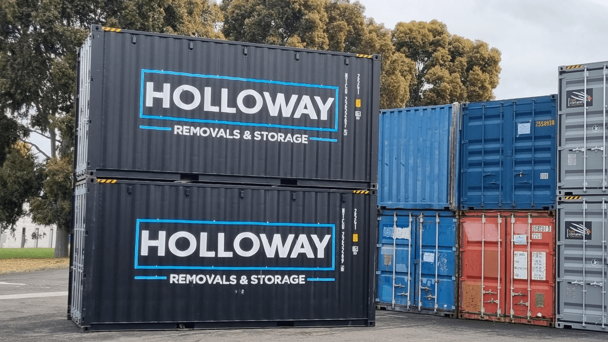 Holloway Removals & Storage shipping containers in a St Peters storage yard.